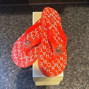 Michael Kors Red Logo Print Thongs with MK Charm